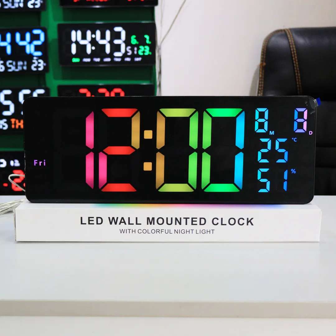 Front view of Large RGB LED Digital Wall Clock in Kenya (Model 6669R) showing colorful time display, date, day, temperature, and humidity on a white box background.