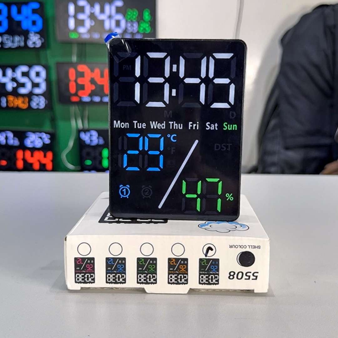 LED digital desk clock displaying 3:45, temperature in blue (8°C), and day of the week highlight for Sunday